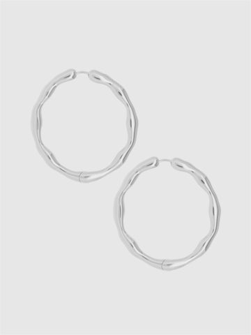 Pair of silver hoop earrings on a light gray background